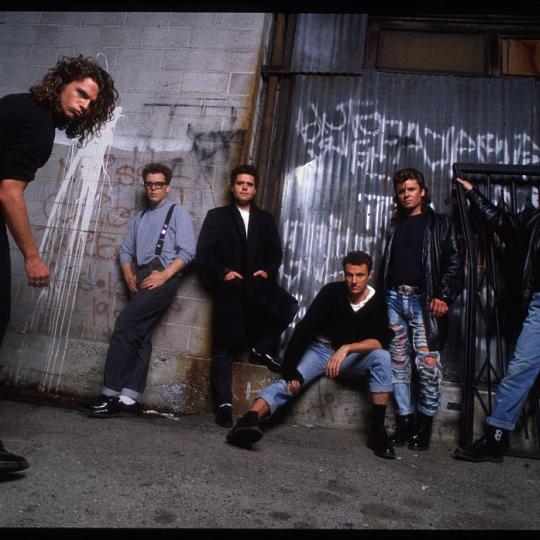 Rock band INXS (from left): Michael Hutchence, Kirk Pengilly, Andrew Farriss, Garry Gary Beers, Tim Farriss, and Jon Farriss. (Photo by Lynn Goldsmith/Corbis/VCG via Getty Images)