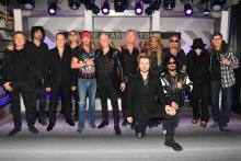  (L-R) Rick Allen, Tommy Lee, Vivian Campbell, Joe Elliott, Bret Michaels, Phil Collen, Rick Savage, Rikki Rockett, C.C. DeVille, Nikki Sixx, Vince Neil, Mick Mars, and Bobby Dall attend the Press Conference with Mötley Crüe, Def Leppard, and Poison announcing 2020 Stadium Tour on December 04, 2019 in Hollywood, California. (Photo by Kevin Winter/Getty Images)