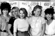 (L-R) Bassist Kathy Valentine, Guitarist Charlotte Cafffey, drummer Gina Shock, singer Belinda Carlisle, and guitarist Jane Wiedlin of the rock band "The Go-Go's" at a press conference in circa 1984. (Photo by Michael Ochs Archives/Getty Images)