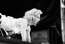 Madonna, vocal performs at the Feijenoord Stadium with Blonde ambition tour in Rotterdam, the Netherlands on 24th July 1990. (Photo by Frans Schellekens/Redferns)