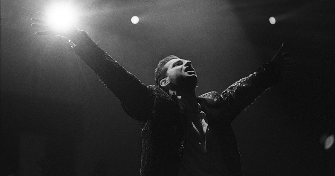 ROTTERDAM, NETHERLANDS - 26th OCTOBER: Singer Dave Gahan from English group Depeche Mode performs live on stage at Ahoy in Rotterdam, Netherlands on 26th October 1990. (Photo by Rob Verhorst/Redferns)