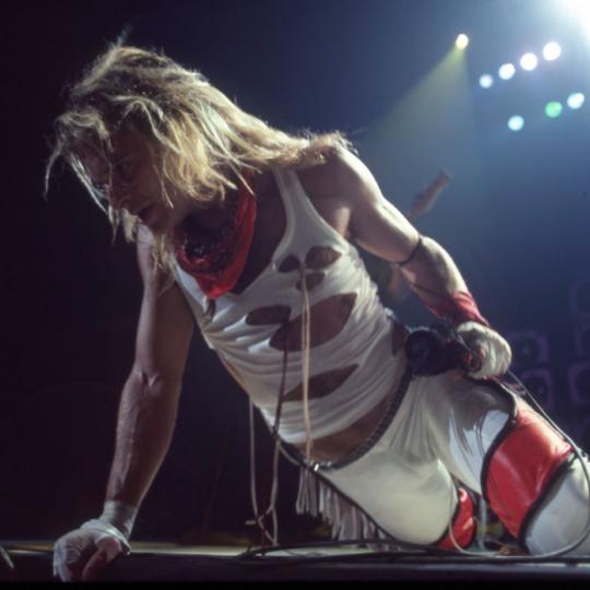 DETROIT - JULY 3: American rock vocalist, musician, songwriter and original lead singer of Van Halen, David Lee Roth, performs during the band's "Fair Warning Tour" on July 3, 1981, at Cobo Arena in Detroit, Michigan. (Photo by Ross Marino/Getty Images)