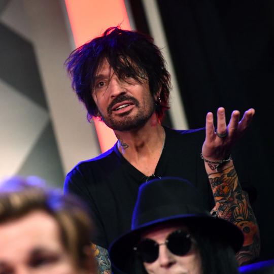 LOS ANGELES, CALIFORNIA - DECEMBER 04: Tommy Lee of M?tley Cr?e speaks during the press conference for THE STADIUM TOUR DEF LEPPARD - MOTLEY CRUE - POISON at SiriusXM Studios on December 04, 2019 in Los Angeles, California. (Photo by Emma McIntyre/Getty Images for SiriusXM)