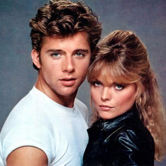 Michelle Pfeiffer and Maxwell Caufiled in Grease 2 