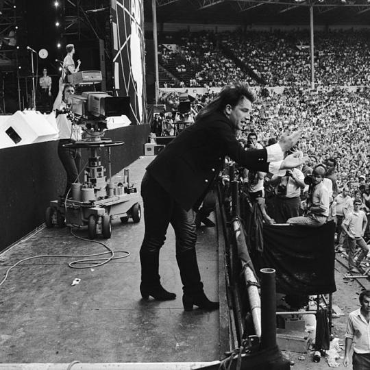 U2 performing at Live Aid in 1985
