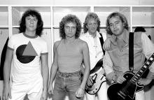 Portrait of the American-based rock band Foreigner as they pose backsatge at the Rosemont Horizon, Rosemont, Illinois, November 8, 1981. Pictured are, from left, Dennis Elliot, Lou Gramm, Rick Wills, and Mick Jones. (Photo by Paul Natkin/Getty Images)