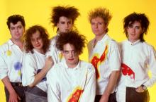 DETROIT, MI - JULY 30: (L-R) Drummer and keyboardist Lol Tolhurst, bass guitarist Porl Thompson, bassist Simon Gallup, English singer, songwriter and musician Robert Smith, drummer Boris Williams and keyboardist Roger O'Donnell of The Cure pose for a studio portrait during The Kissing Tour on July 30, 1987 at the Cobo Arena in Detroit, Michigan. (Photo by Ross Marino/Getty Images)