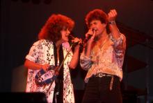 Grace Slick and Mickey Thomas of the Jefferson Starship at the Poplar Creek Music Theater in Hoffman Estates, Illinois, August 1, 1986. (Photo by Paul Natkin/Getty Images)