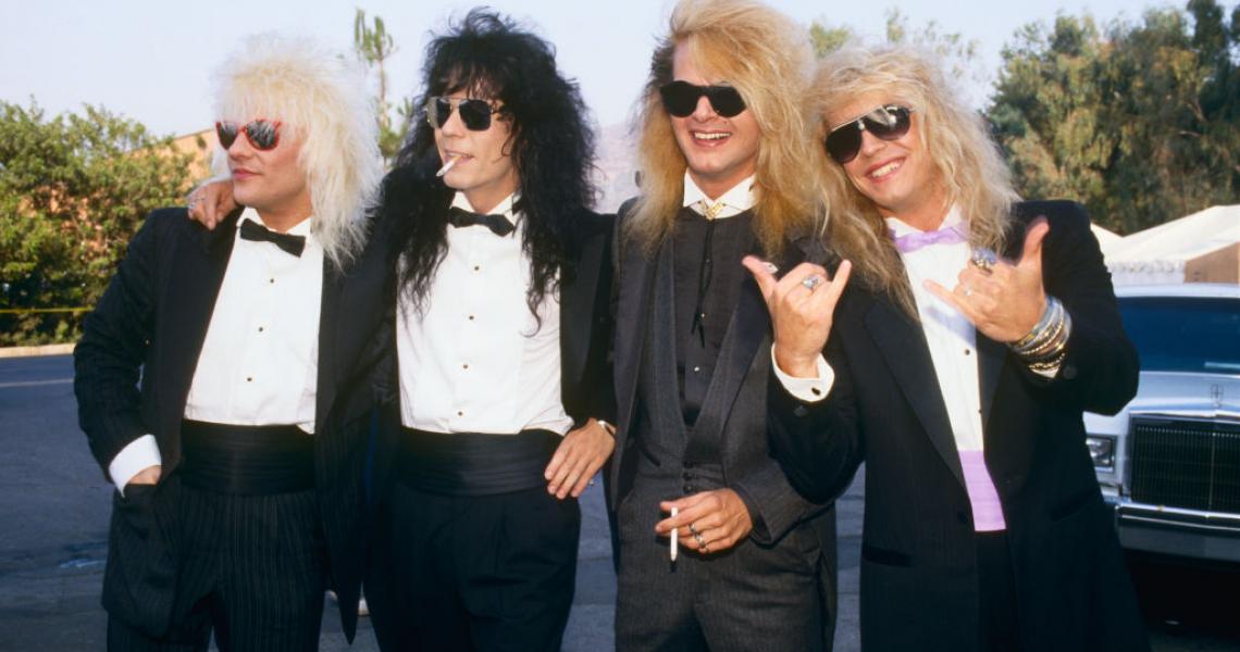 Members of the rock group Poison, Bret Michaels, C.C. DeVille, Rikki Rockett and Bobby Dall, pose on the red carpet at the 1987 Universal City, California, MTV Music Video Awards. (Photo by George Rose/Getty Images)