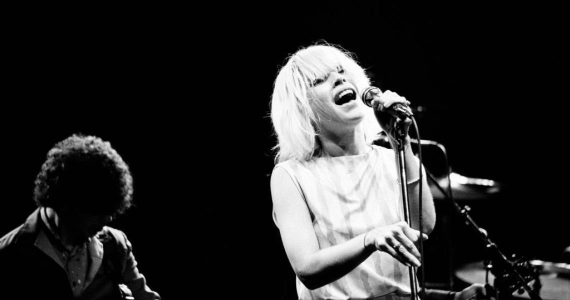 Debbie Harry in concert with Blondie, at the Odeon, Birmingham, part of their European Tour 1979-'80. 7th January 1980. (Photo by Staff/Mirrorpix/Getty Images)