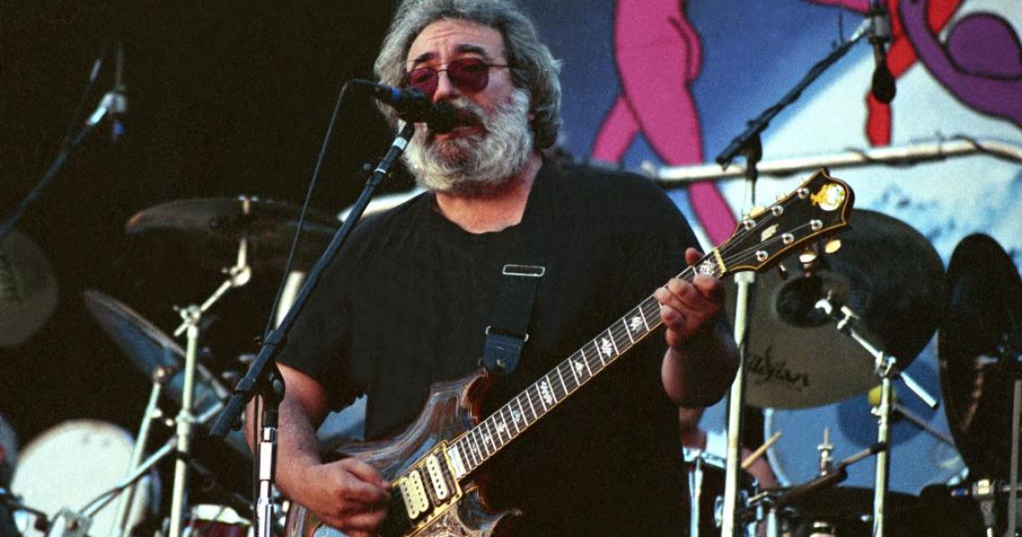 Jerry Garcia of the Grateful Dead performs at the Greek Theatre on August 17, 1988 in Berkeley, California. (Photo by Tim Mosenfelder/Getty Images)
