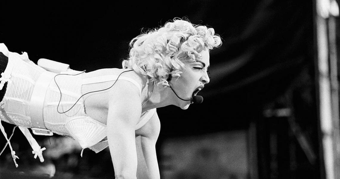 Madonna, vocal performs at the Feijenoord Stadium with Blonde ambition tour in Rotterdam, the Netherlands on 24th July 1990. (Photo by Frans Schellekens/Redferns)