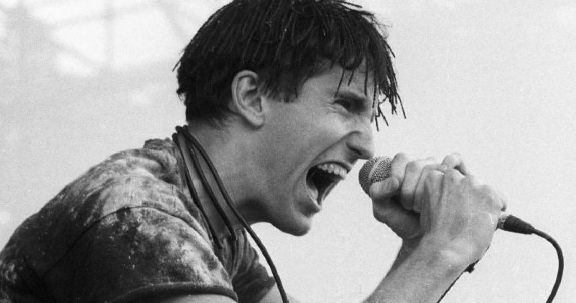 American musician Trent Reznor, of the group Nine Inch Nails, performs in concert, New York, New York, circa 1990. (Photo by Larry Busacca/WireImage)