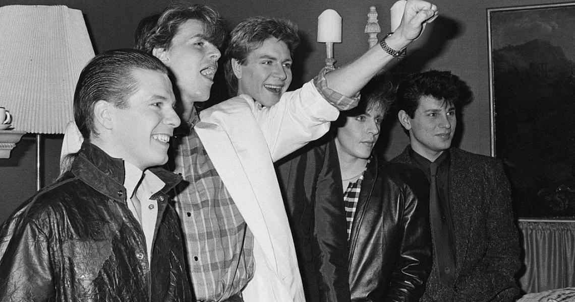 Duran Duran at a press call in a London hotel, November 1983. Andy Taylor, John Taylor, Simon Le Bon, Nick Rhodes, Roger Taylor. (Photo by Erica Echenberg/Redferns)
