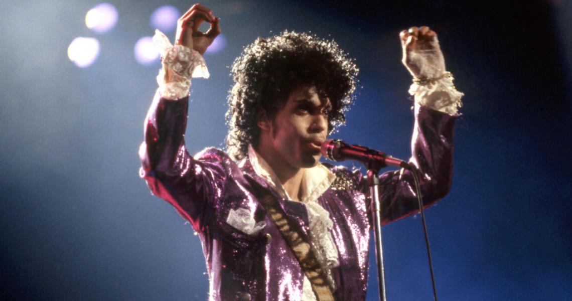 DETROIT, MI - NOVEMBER 4: American singer, songwriter, musician, record producer, dancer, actor, and filmmaker Prince (1958-2016) performs onstage during the 1984 Purple Rain Tour on November 4, 1984, at the Joe Louis Arena in Detroit, Michigan. (Photo by Ross Marino/Getty Images)