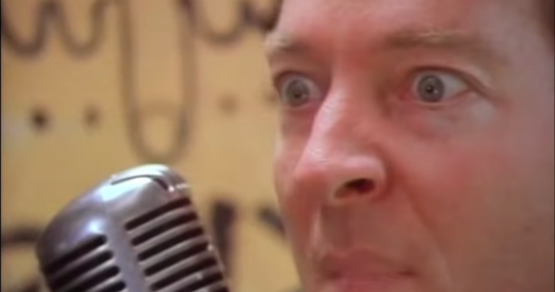 Fred Schneider of The B-52's in the "Love Shack" video
